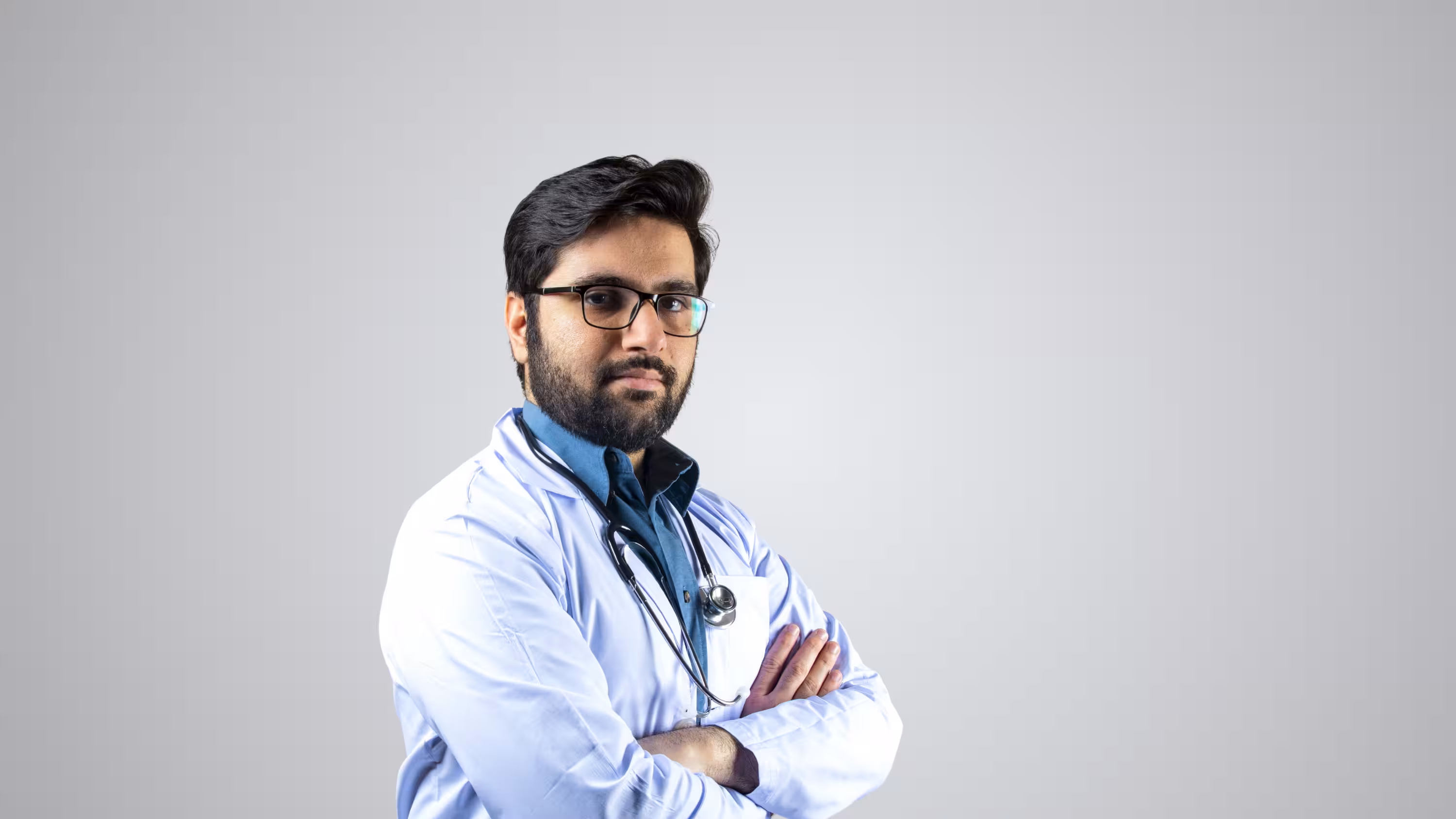 Orthopedic surgeon with arms crossed at Instant Orthopedic Care in Draper, UT